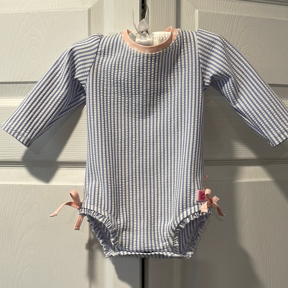 Ruffle butts seersucker and pink bathing body suit .  6-12m girls